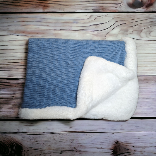 Fluffy knit stroller blanket.